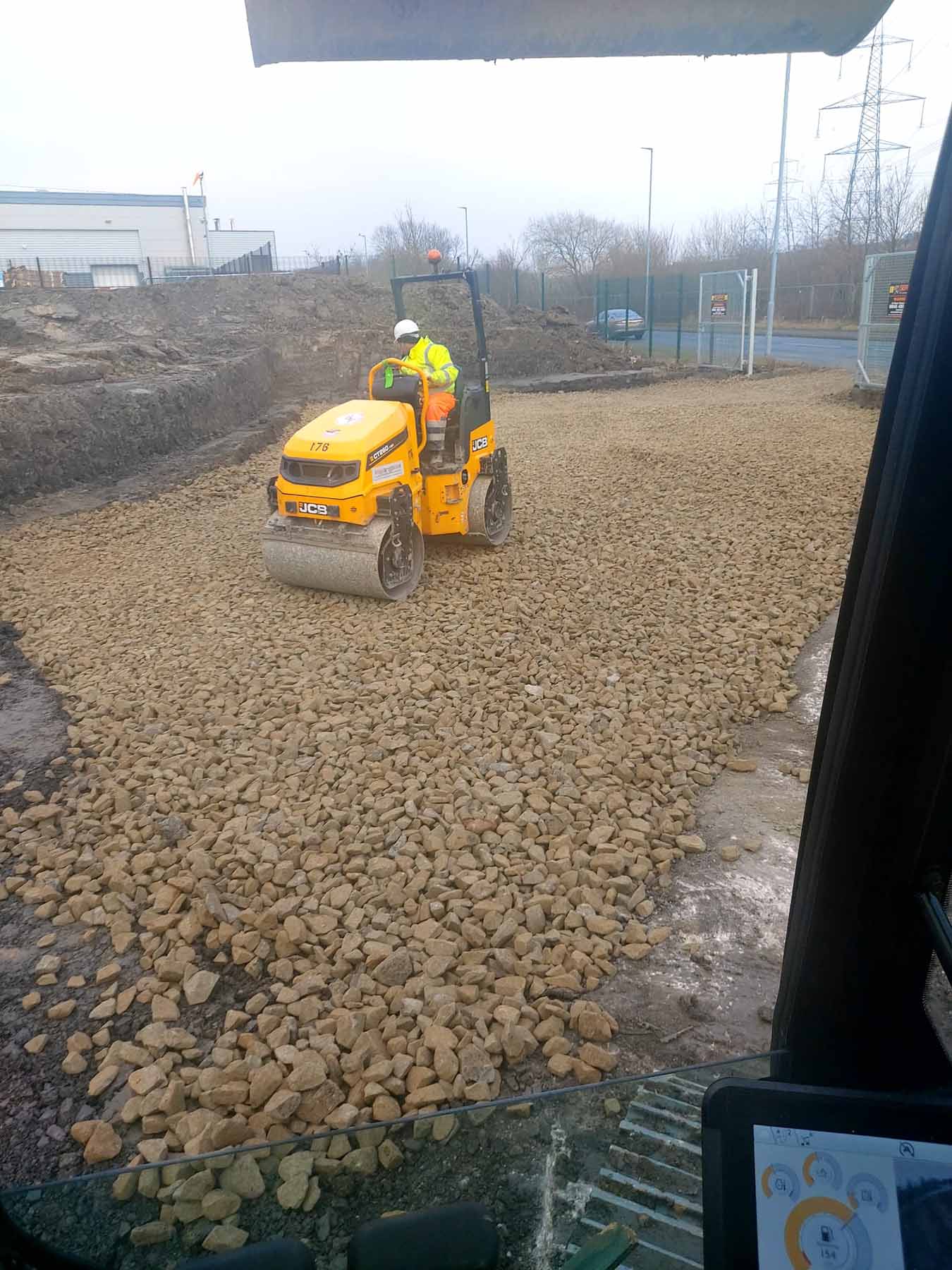 SMW Construction Services, groundworks contractor South Yorkshire, excavation services South Yorkshire, site preparation and clearance, concrete foundations UK, drainage installation for construction sites, kerbing and paving works, concrete flooring specialists, road and footpath preparation, civil engineering groundwork, construction site excavation team, slabbing and finishing works, trenching and drainage systems, site machinery in operation, groundwork specialists on site, commercial groundwork services, residential construction groundwork, heavy plant machinery excavation, SMW Construction Services team, professional site preparation, concrete pour and finishing work