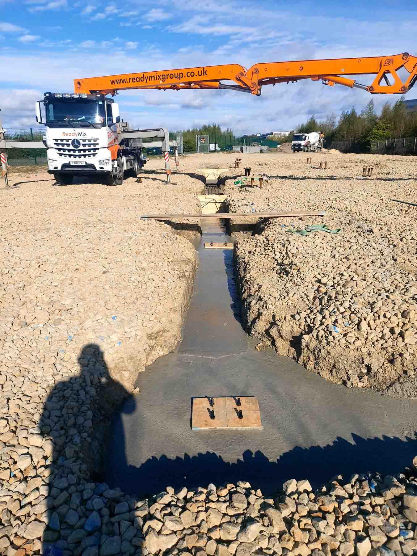 SMW Construction Services, groundworks contractor South Yorkshire, excavation services South Yorkshire, site preparation and clearance, concrete foundations UK, drainage installation for construction sites, kerbing and paving works, concrete flooring specialists, road and footpath preparation, civil engineering groundwork, construction site excavation team, slabbing and finishing works, trenching and drainage systems, site machinery in operation, groundwork specialists on site, commercial groundwork services, residential construction groundwork, heavy plant machinery excavation, SMW Construction Services team, professional site preparation, concrete pour and finishing work
