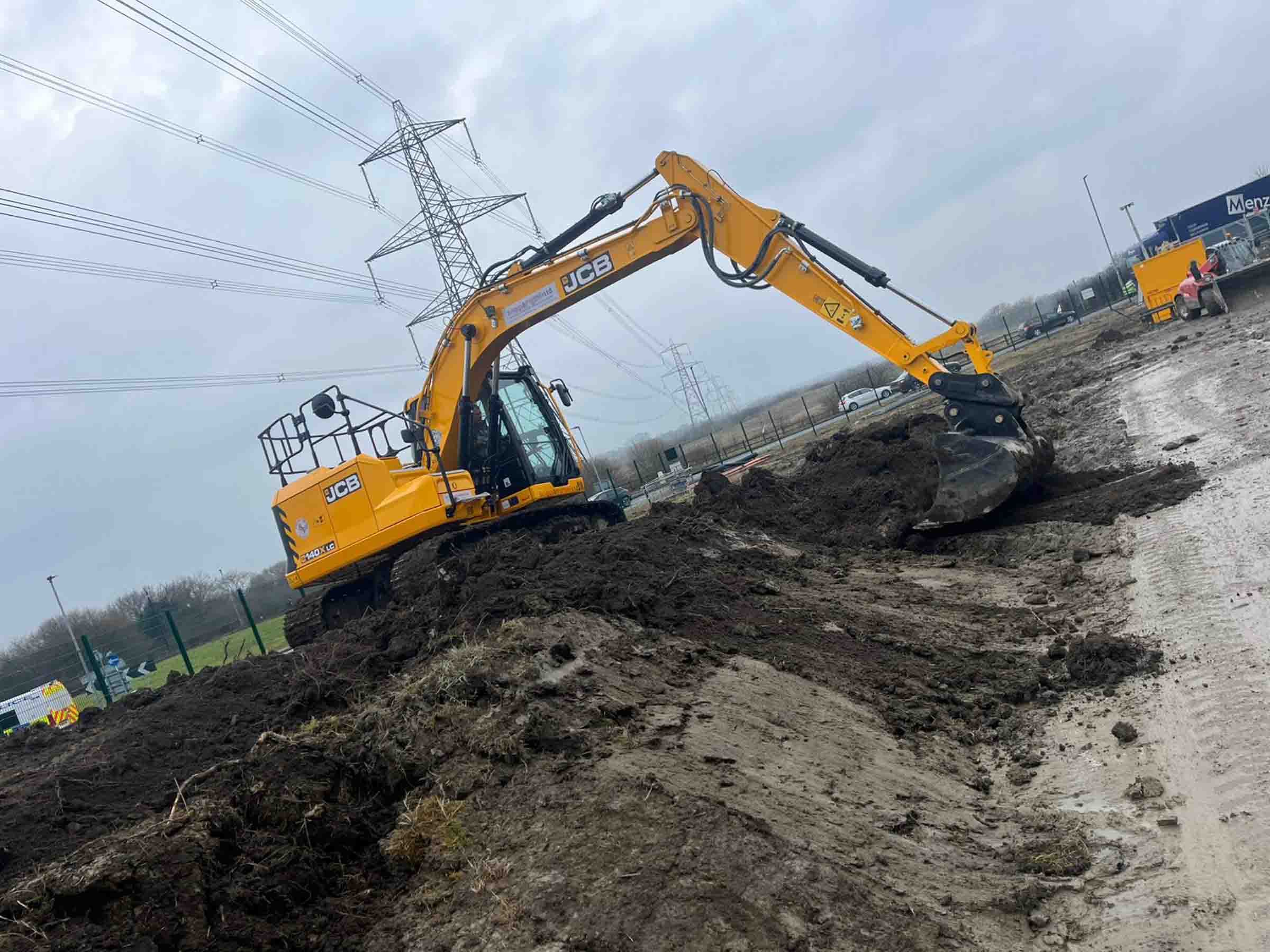 SMW Construction Services 14 SMW Construction Services, groundworks contractor South Yorkshire, excavation services South Yorkshire, site preparation and clearance, concrete foundations UK, drainage installation for construction sites, kerbing and paving works, concrete flooring specialists, road and footpath preparation, civil engineering groundwork, construction site excavation team, slabbing and finishing works, trenching and drainage systems, site machinery in operation, groundwork specialists on site, commercial groundwork services, residential construction groundwork, heavy plant machinery excavation, SMW Construction Services team, professional site preparation, concrete pour and finishing work