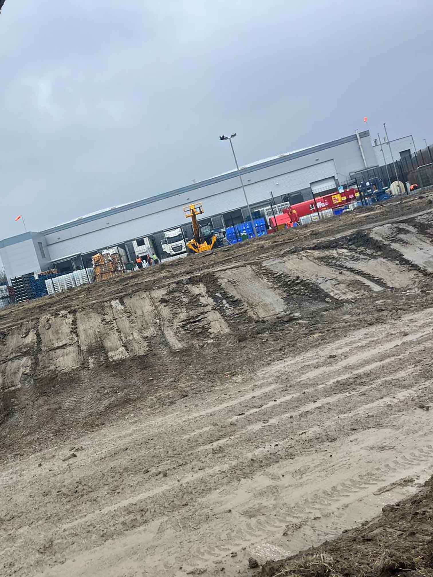 SMW Construction Services, groundworks contractor South Yorkshire, excavation services South Yorkshire, site preparation and clearance, concrete foundations UK, drainage installation for construction sites, kerbing and paving works, concrete flooring specialists, road and footpath preparation, civil engineering groundwork, construction site excavation team, slabbing and finishing works, trenching and drainage systems, site machinery in operation, groundwork specialists on site, commercial groundwork services, residential construction groundwork, heavy plant machinery excavation, SMW Construction Services team, professional site preparation, concrete pour and finishing work