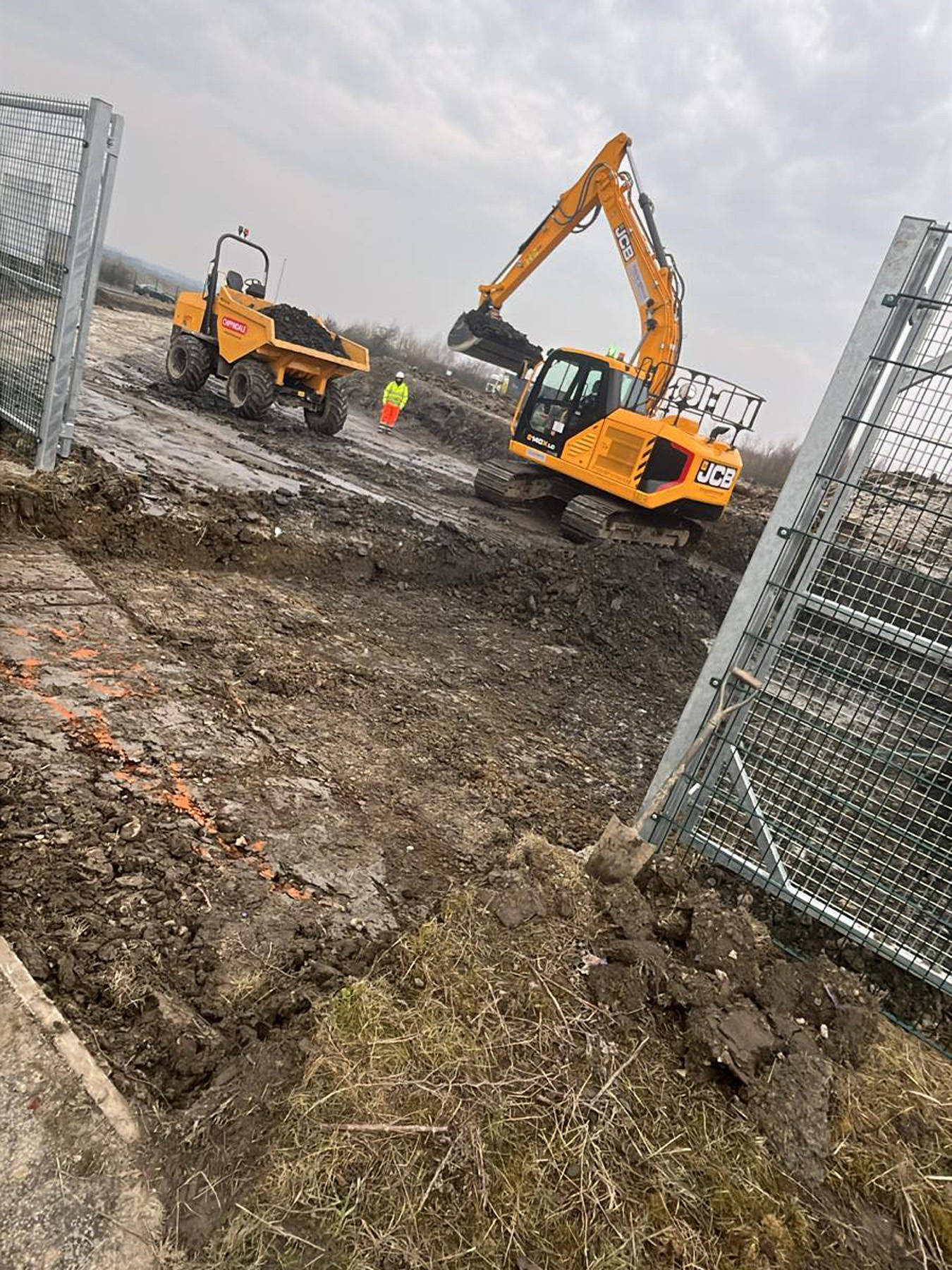 SMW Construction Services, groundworks contractor South Yorkshire, excavation services South Yorkshire, site preparation and clearance, concrete foundations UK, drainage installation for construction sites, kerbing and paving works, concrete flooring specialists, road and footpath preparation, civil engineering groundwork, construction site excavation team, slabbing and finishing works, trenching and drainage systems, site machinery in operation, groundwork specialists on site, commercial groundwork services, residential construction groundwork, heavy plant machinery excavation, SMW Construction Services team, professional site preparation, concrete pour and finishing work