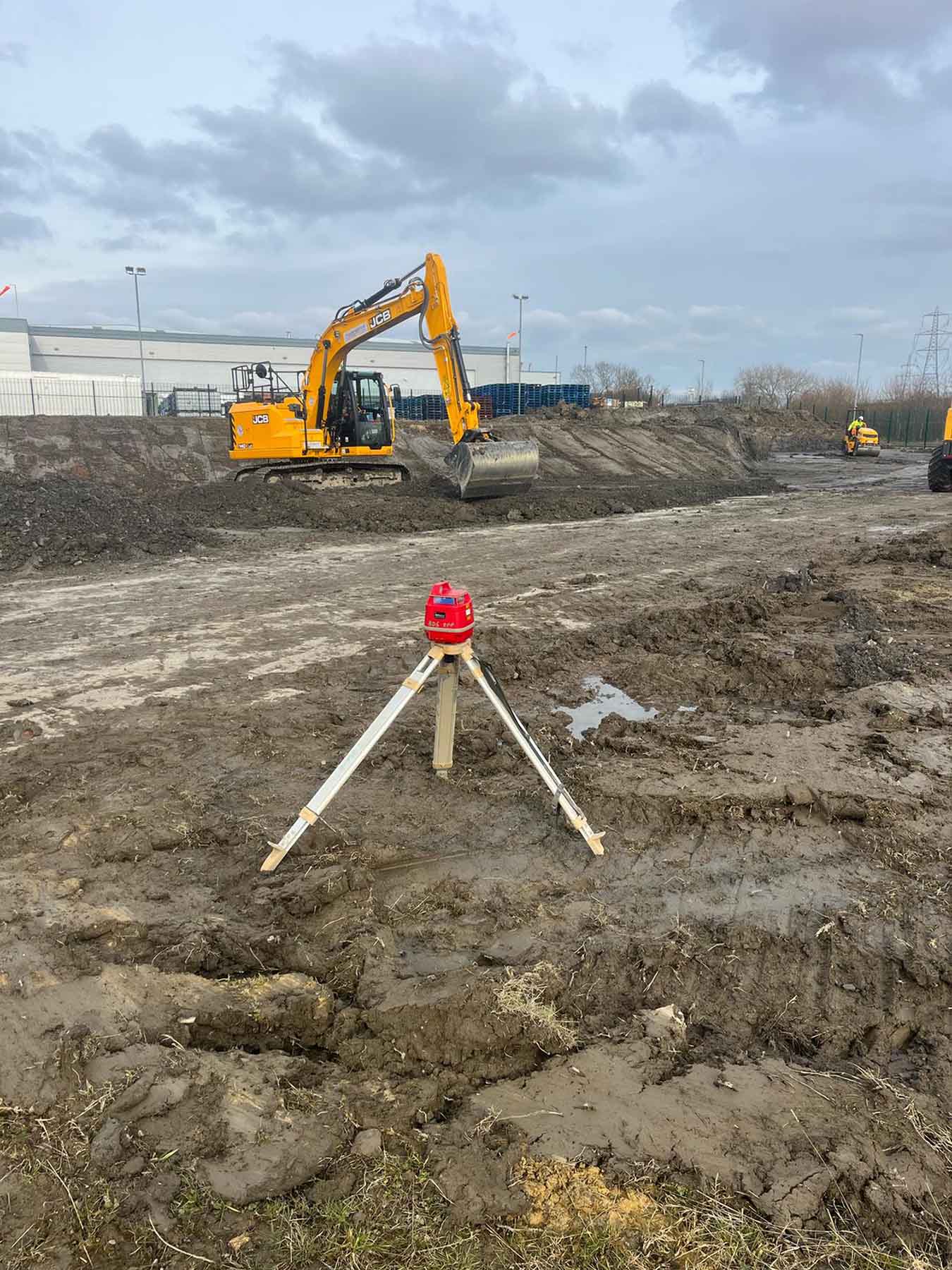 SMW Construction Services, groundworks contractor South Yorkshire, excavation services South Yorkshire, site preparation and clearance, concrete foundations UK, drainage installation for construction sites, kerbing and paving works, concrete flooring specialists, road and footpath preparation, civil engineering groundwork, construction site excavation team, slabbing and finishing works, trenching and drainage systems, site machinery in operation, groundwork specialists on site, commercial groundwork services, residential construction groundwork, heavy plant machinery excavation, SMW Construction Services team, professional site preparation, concrete pour and finishing work