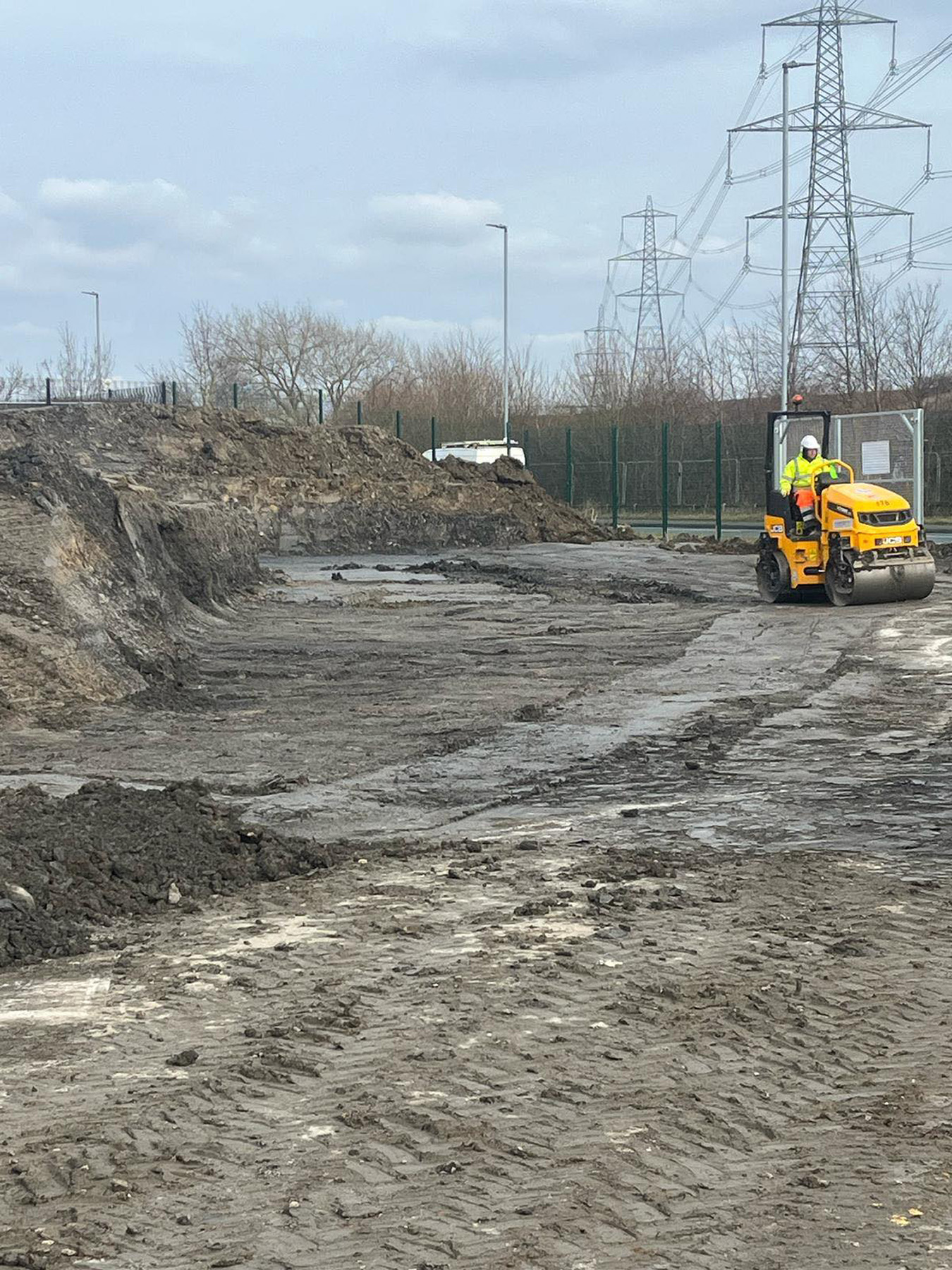 SMW Construction Services, groundworks contractor South Yorkshire, excavation services South Yorkshire, site preparation and clearance, concrete foundations UK, drainage installation for construction sites, kerbing and paving works, concrete flooring specialists, road and footpath preparation, civil engineering groundwork, construction site excavation team, slabbing and finishing works, trenching and drainage systems, site machinery in operation, groundwork specialists on site, commercial groundwork services, residential construction groundwork, heavy plant machinery excavation, SMW Construction Services team, professional site preparation, concrete pour and finishing work